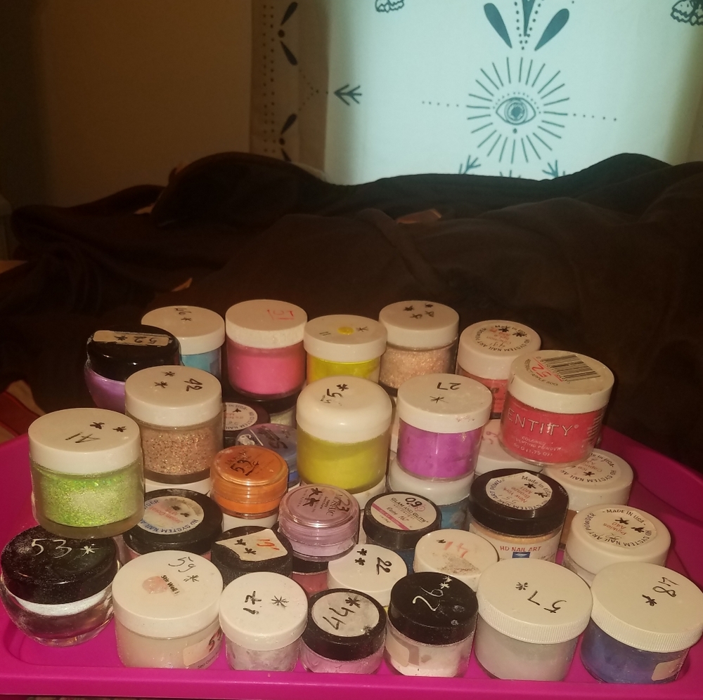 Lot of 49 nail powders.